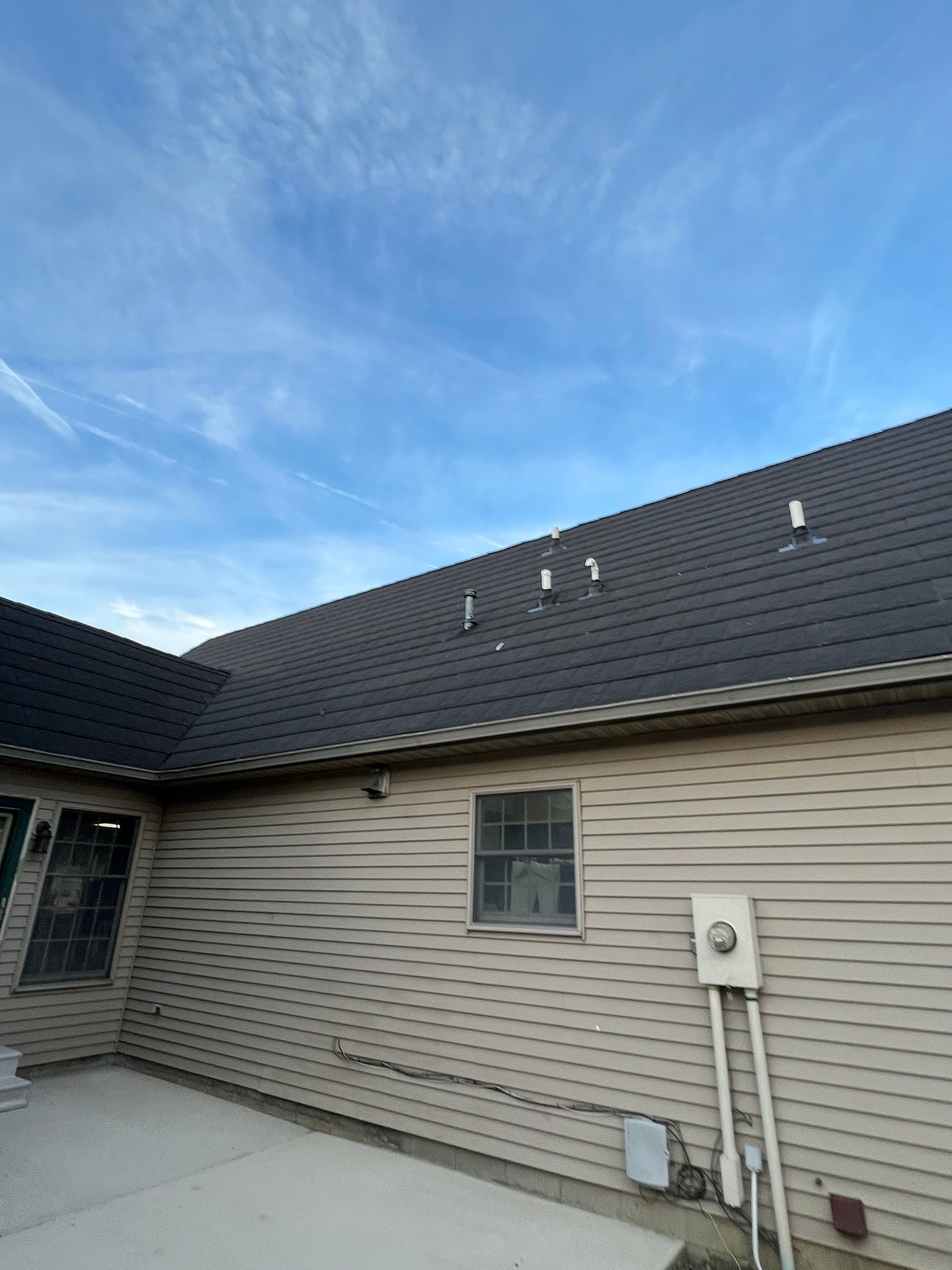 Residential Roofing Repair using Metstar Stone Coated Charcoal by Nitro Roofing and Construction