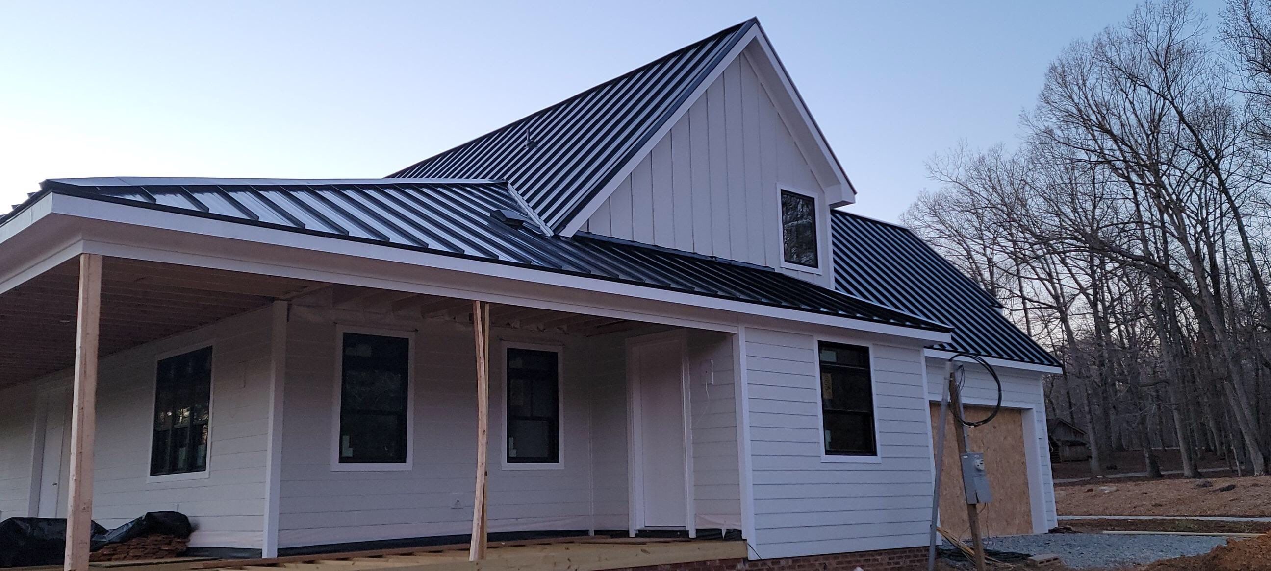 Custom Home Metal Roof Installation by Just In Time Roofing and Restoration