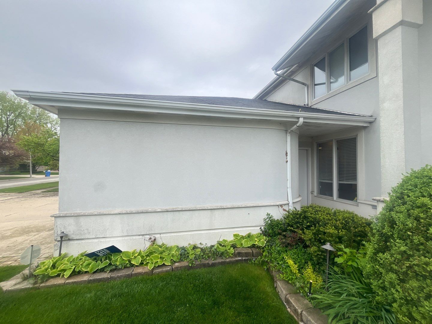 dryvit using Algaecide, soft wash soap by Northern Power Washing LLC.