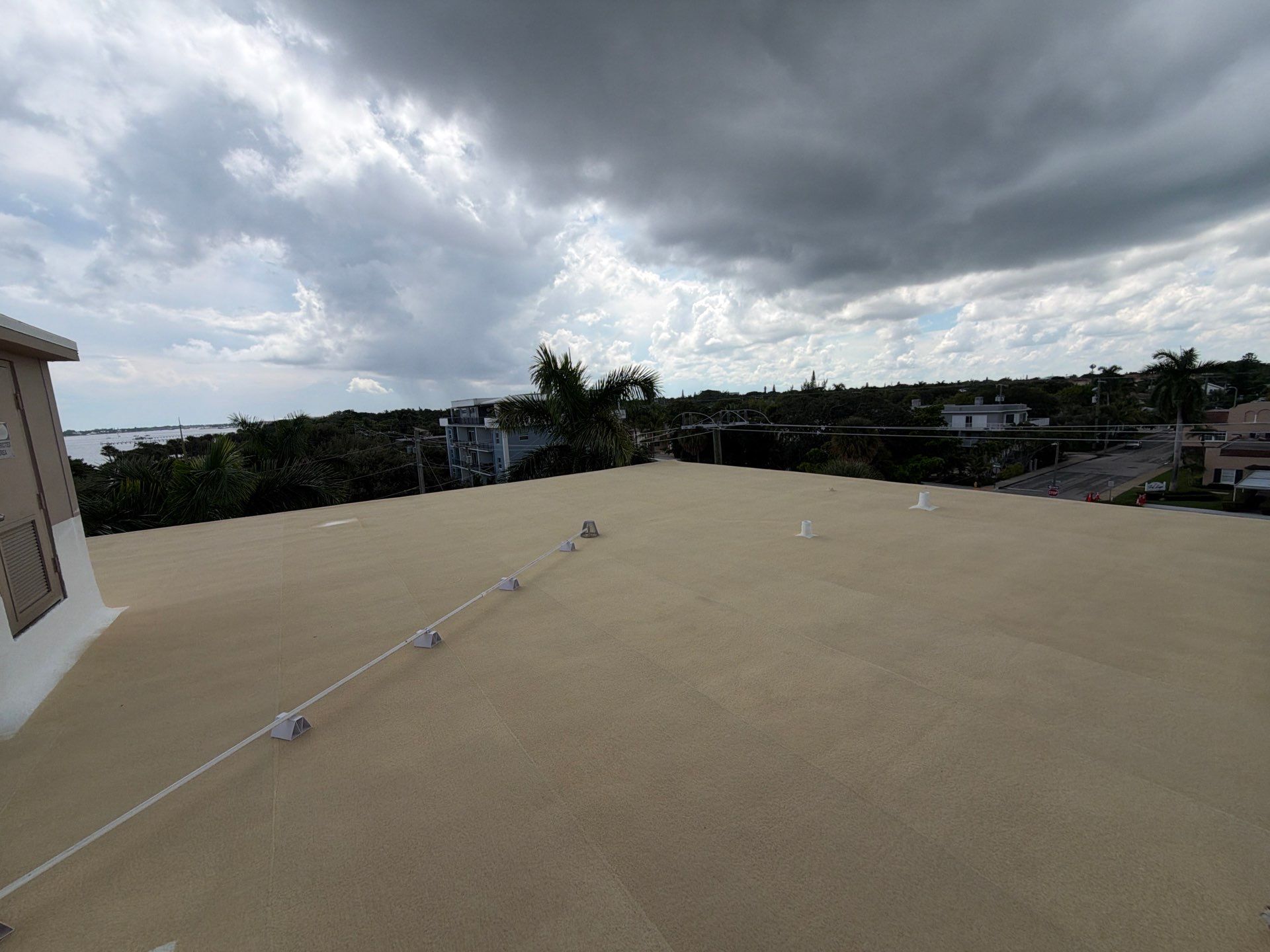 Commercial Roof Restoration for Lake Worth Beach Flat Roof Project by Roof King LLC