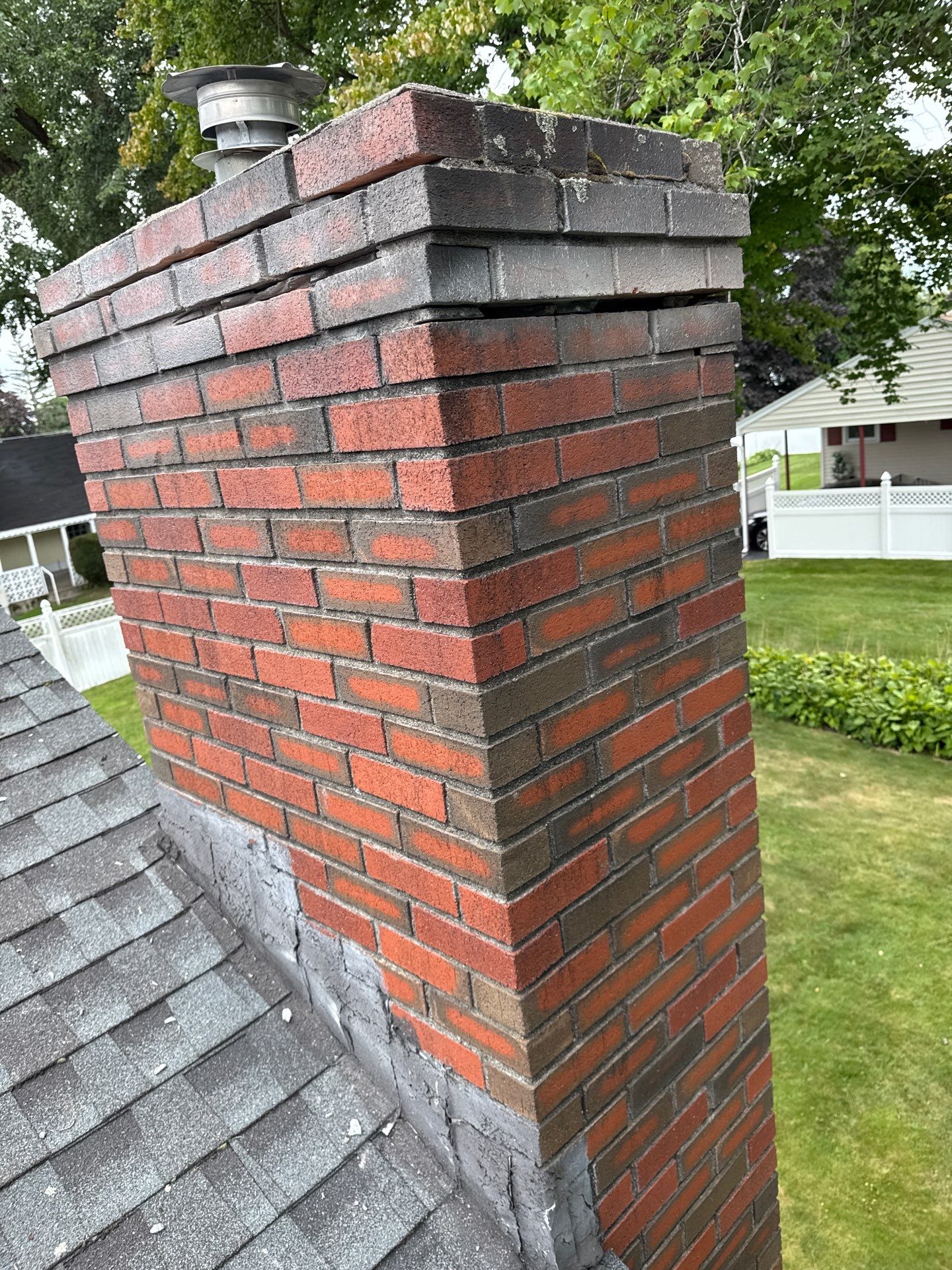 Lowell Premium Velux Curb-Mount Skylight & Chimney Restoration by Mighty Dog Roofing of Greater Middlesex County