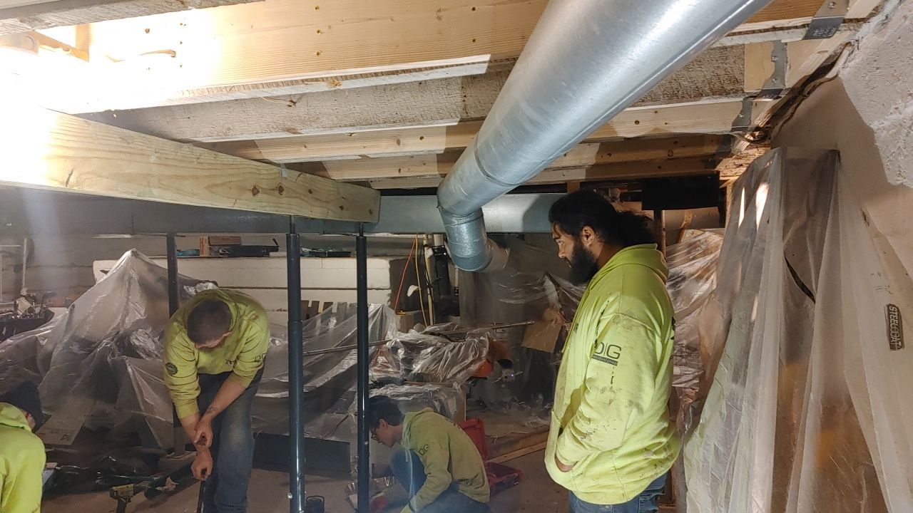 Structural Wood Reinforcement using Structural Wood and Steel Reinforcements (Main Floor Joist) by Toledo Basement Repair