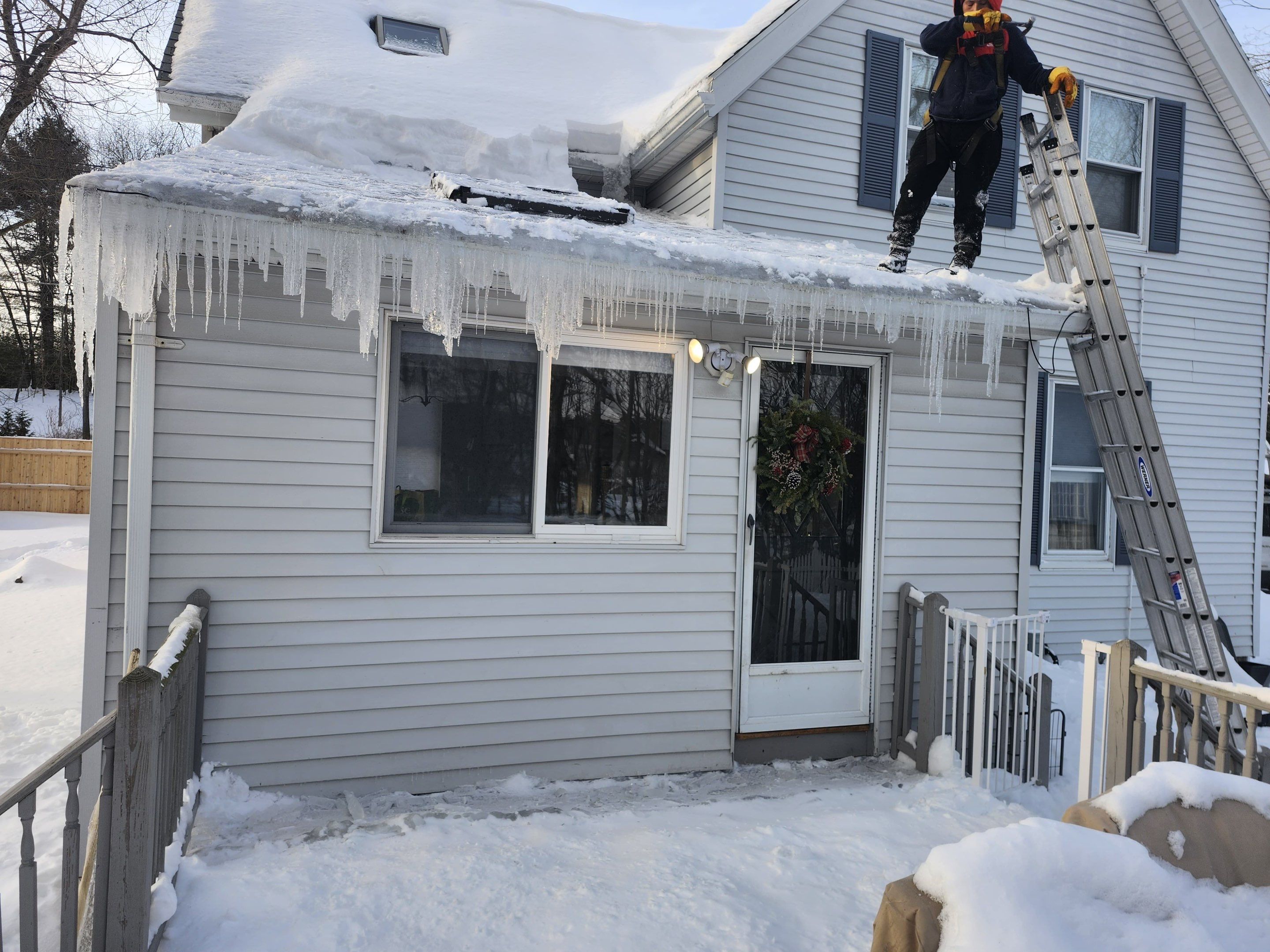 Ice Dam and snow removal by Mighty Dog Roofing of Greater Middlesex County