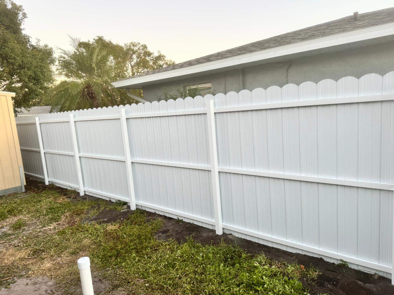 White Vinyl Privacy Fence Installation in Bradenton, Florida by True Fence LLC