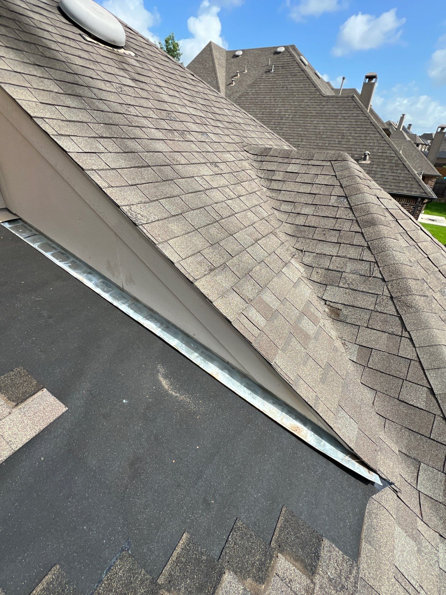 Hail Damage using Owen's Corning Duration (Lifetime) Shingles by Roof Repair Company