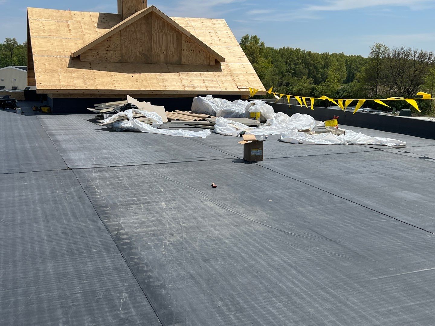 Commercial Roofing Installation using 60 mil rubber roof  by Nitro Roofing and Construction