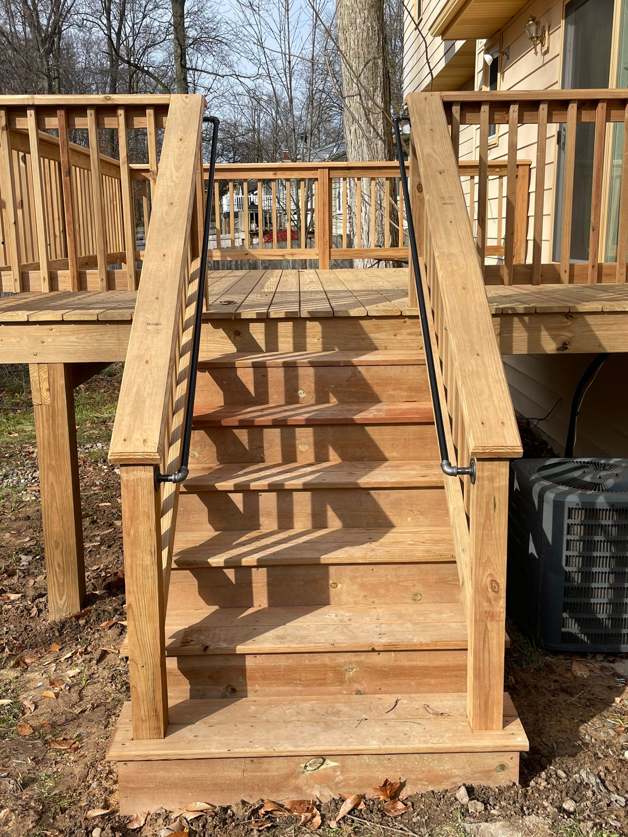 Deck Installation using Treated Lumber by Avalon Roofing and Exteriors