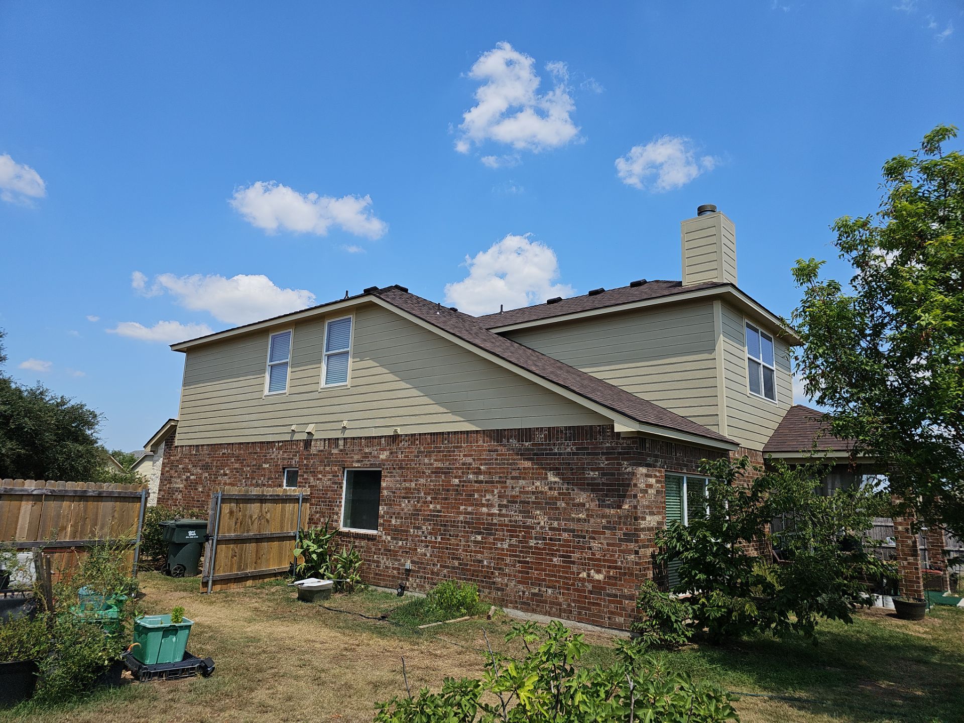 Residential Roofing Installation using Owens Corning Oakridge Brownwood by DeZign Roofing & Exteriors
