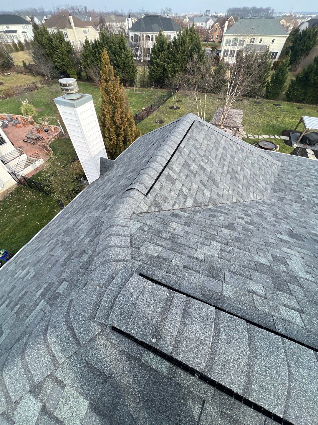 Estate Gray Shingles by Reimagine Roofing