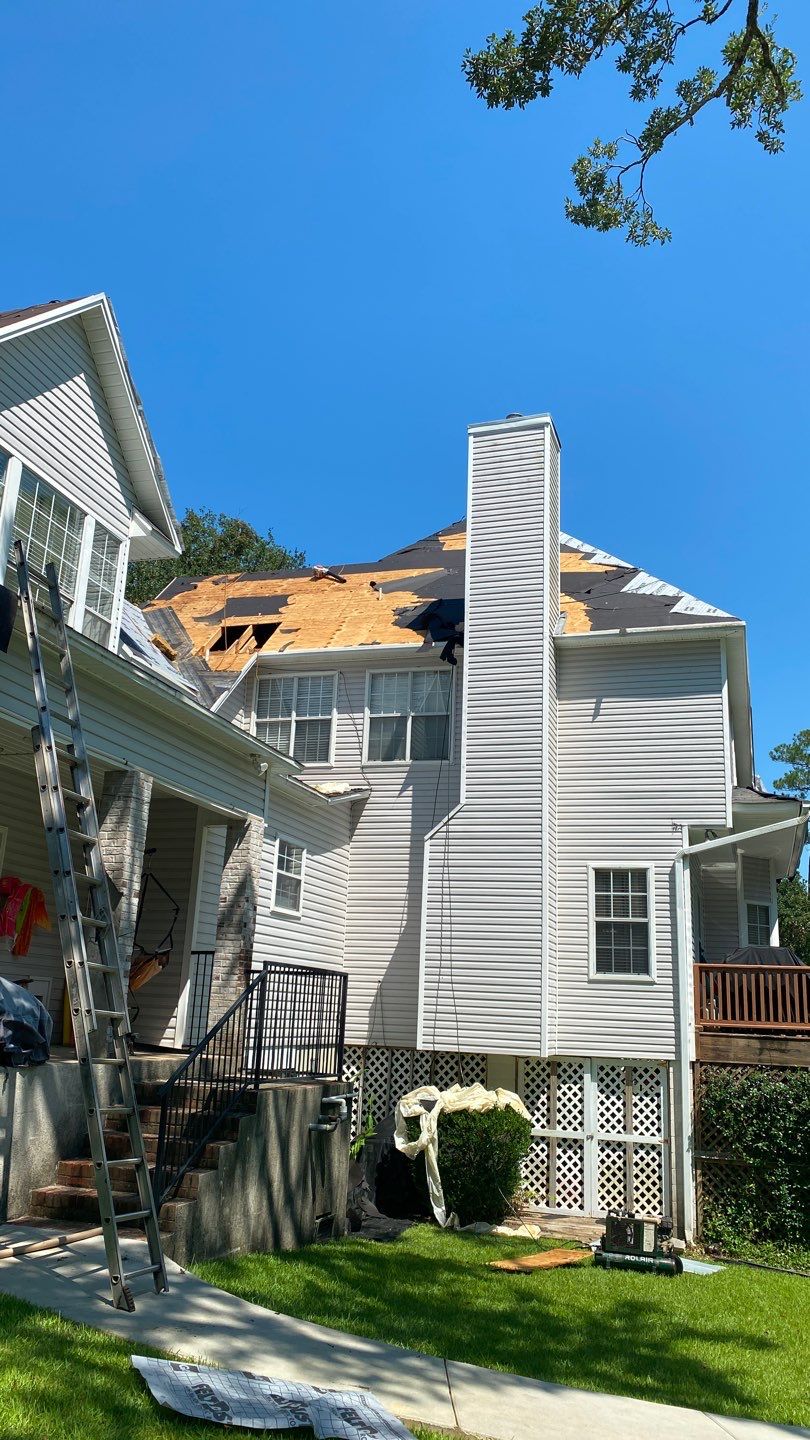 Residential Roofing Installation using Roof Replacement by American Roofing & Construction LLC