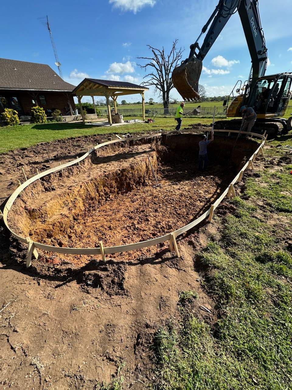 Freeform Pool with Sun Ledge on Rural Lot by Pinnacle Pools and Spas - DFW