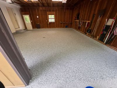 Grand Haven Garage Floor Renovation with Epoxy Flake Coating