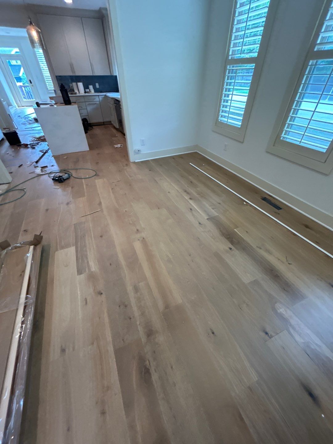 White Oak Hardwood and Checkerboard Tile Installation by Footprints Floors of Nashville