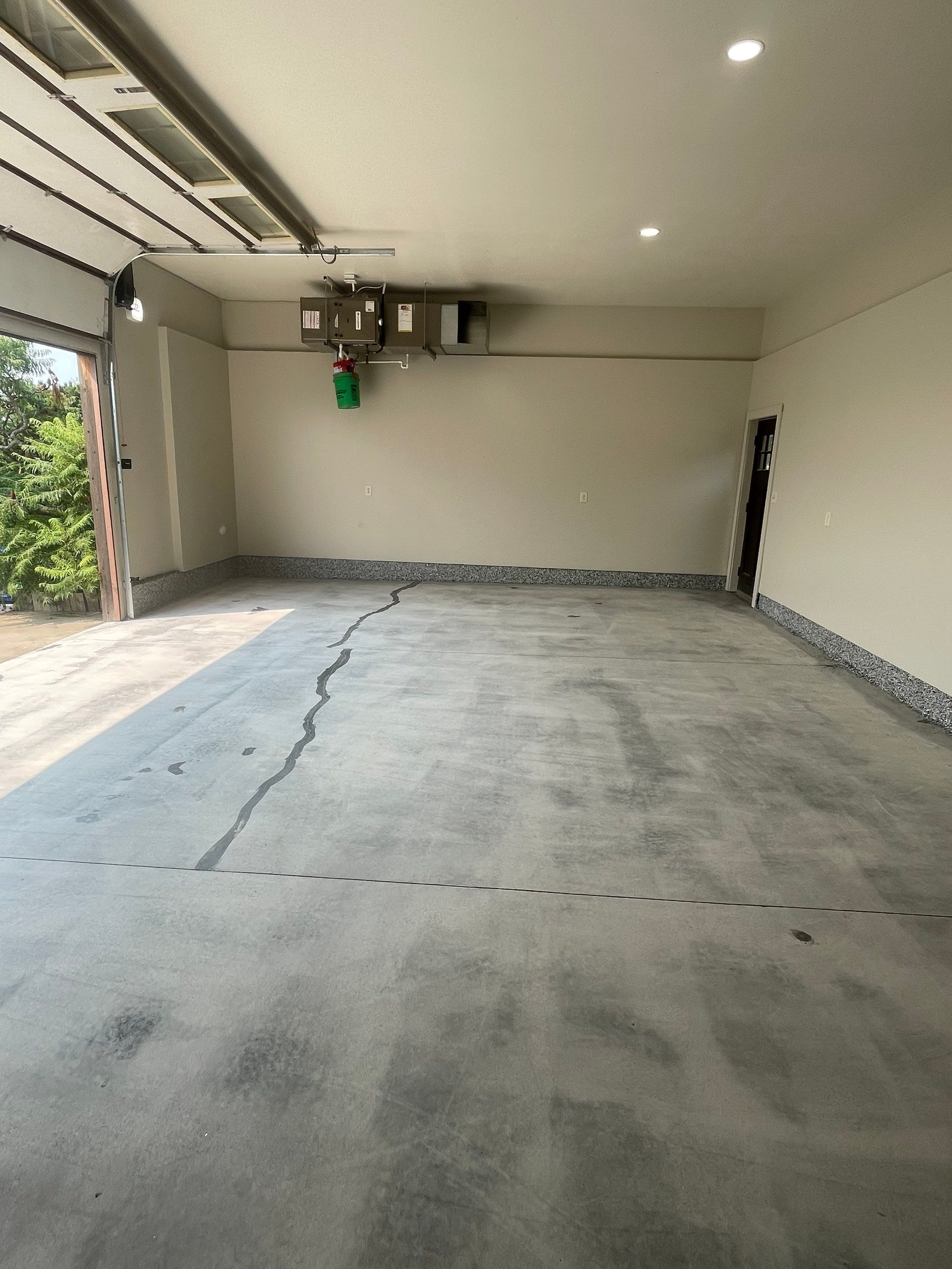 Domino Flake Floor Coating and Crack Repair in Chancellor by Select Painting, Coatings & Garage Cabinets