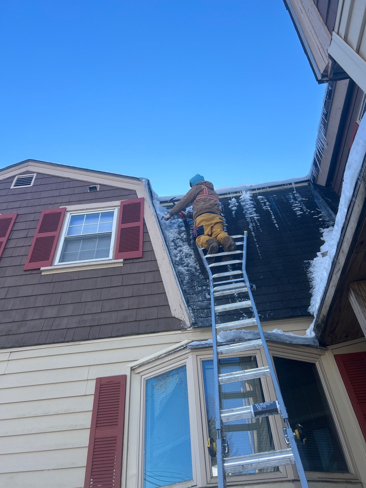 Ice dam removal by Mighty Dog Roofing of Greater Middlesex County