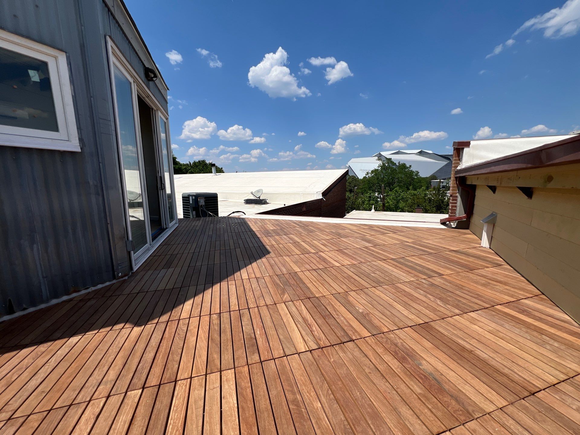 Atlanta Rooftop Deck Renovation with Modular Wood Slat Tiles by Swift Home Renovations