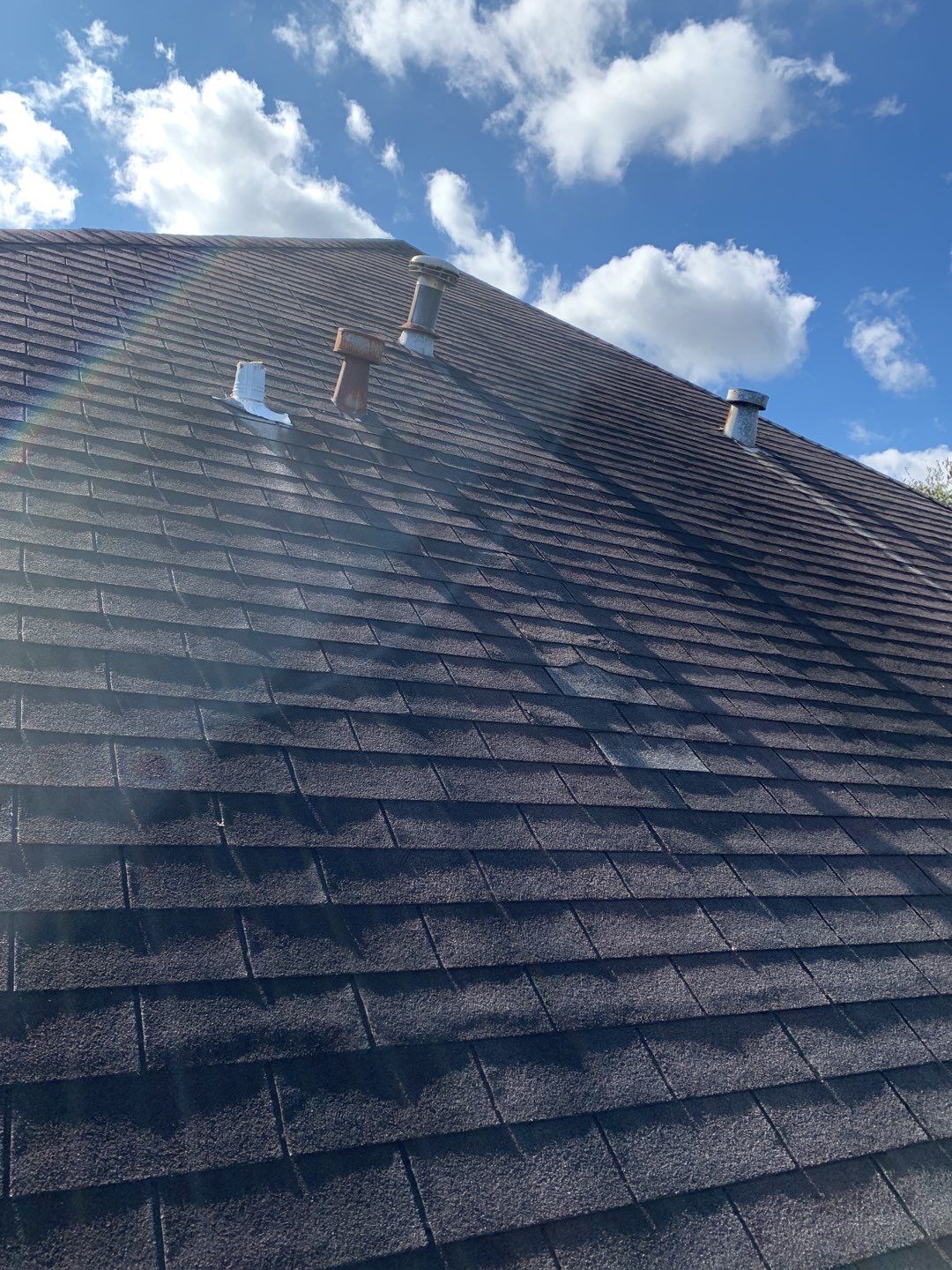 Residential Roofing Installation using Roof Replacement by American Roofing & Construction LLC