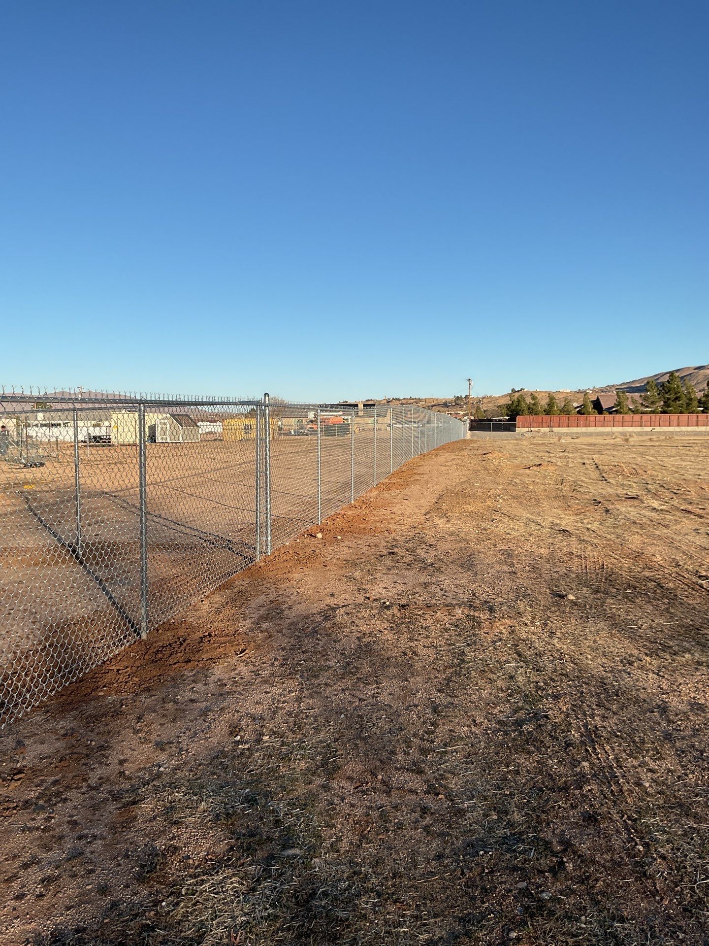6ft and 5 ft chain link by Fence Guys Inc. 