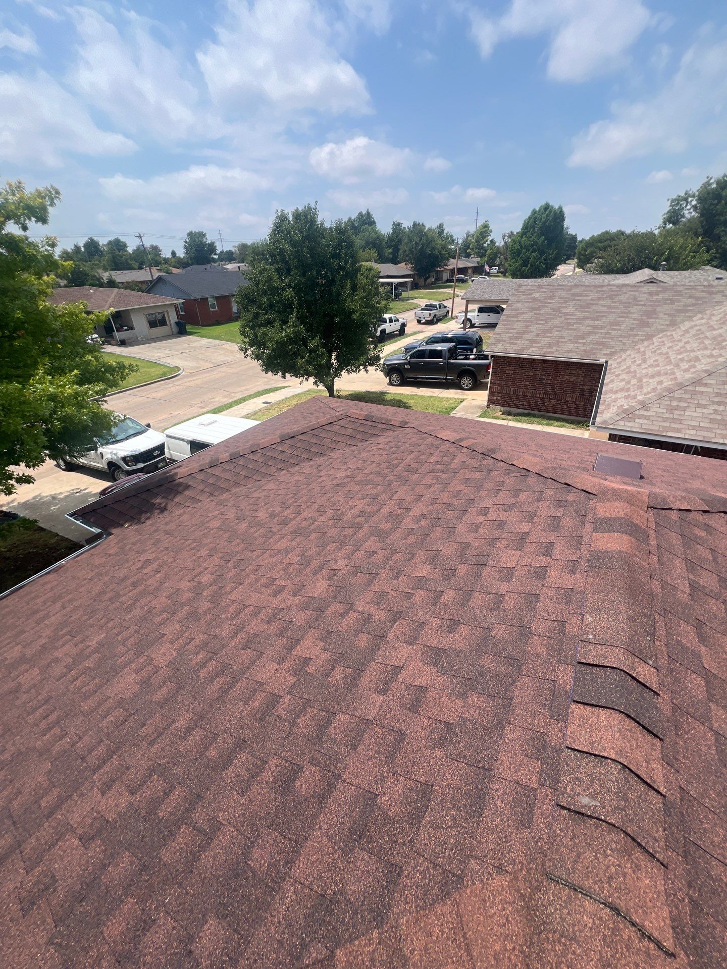 Roof Replacement and Gutter Installation in Oklahoma City, OK by McCann's Roofing and Construction