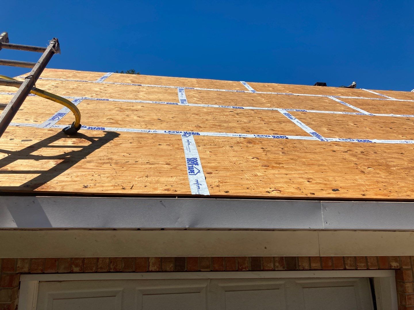 Residential Roofing Installation using Roof Replacement by American Roofing & Construction LLC