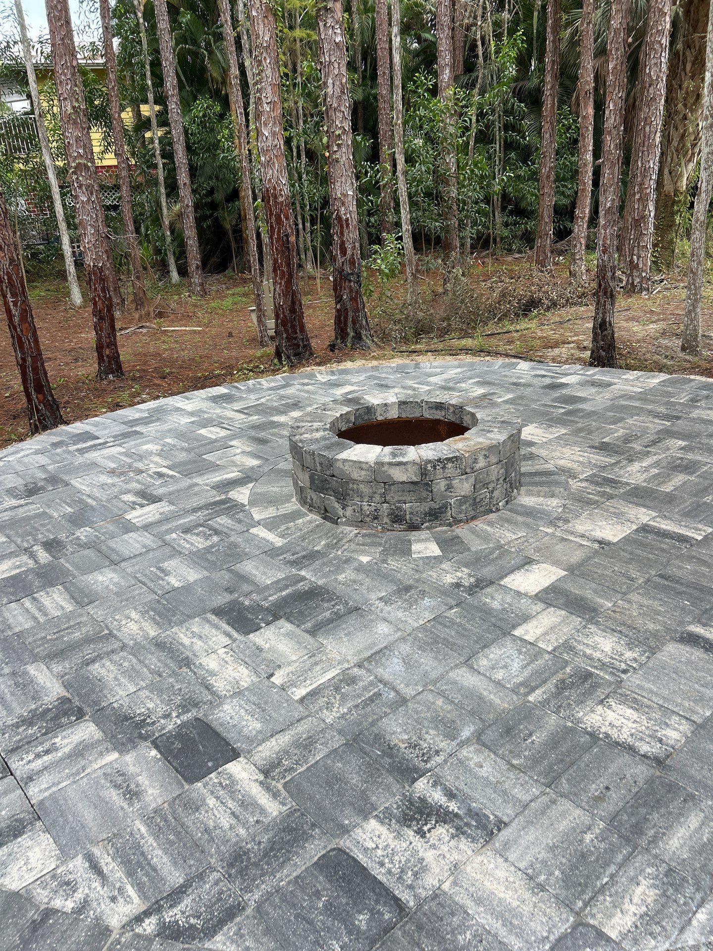 Fire pit and seating area/Oaks Blvd Naples by Old Town Pavers Llc