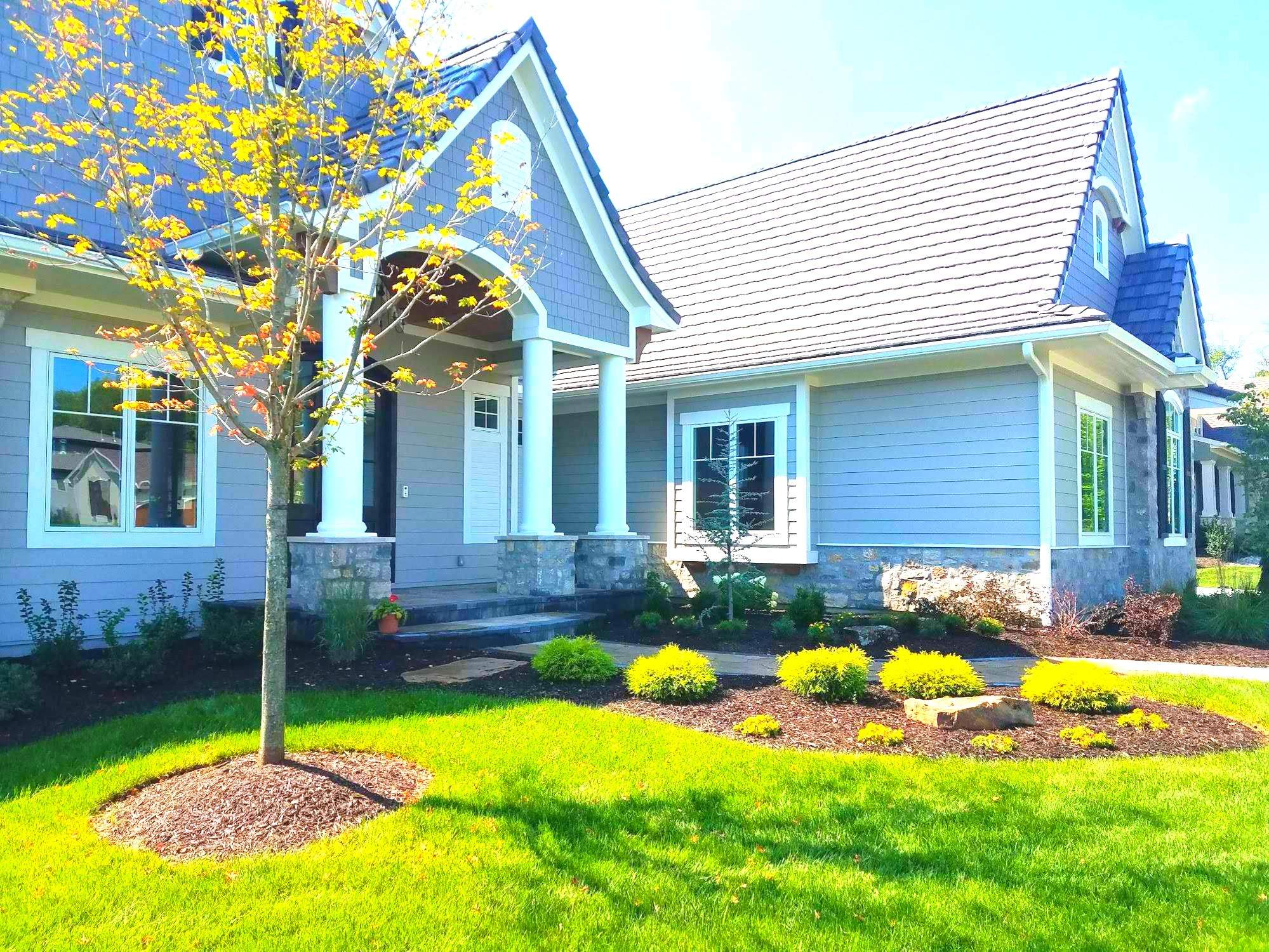 Front Yard Landscape and Walkway Renovation in Overland Park by LAND ESCAPES LLC