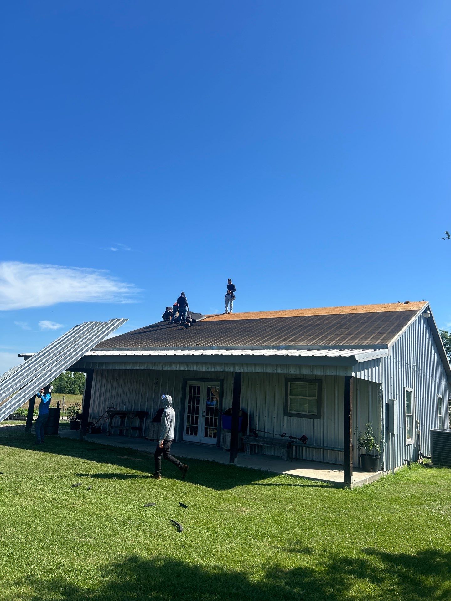 Residential Roofing Installation using Metal by Roof Repair Company