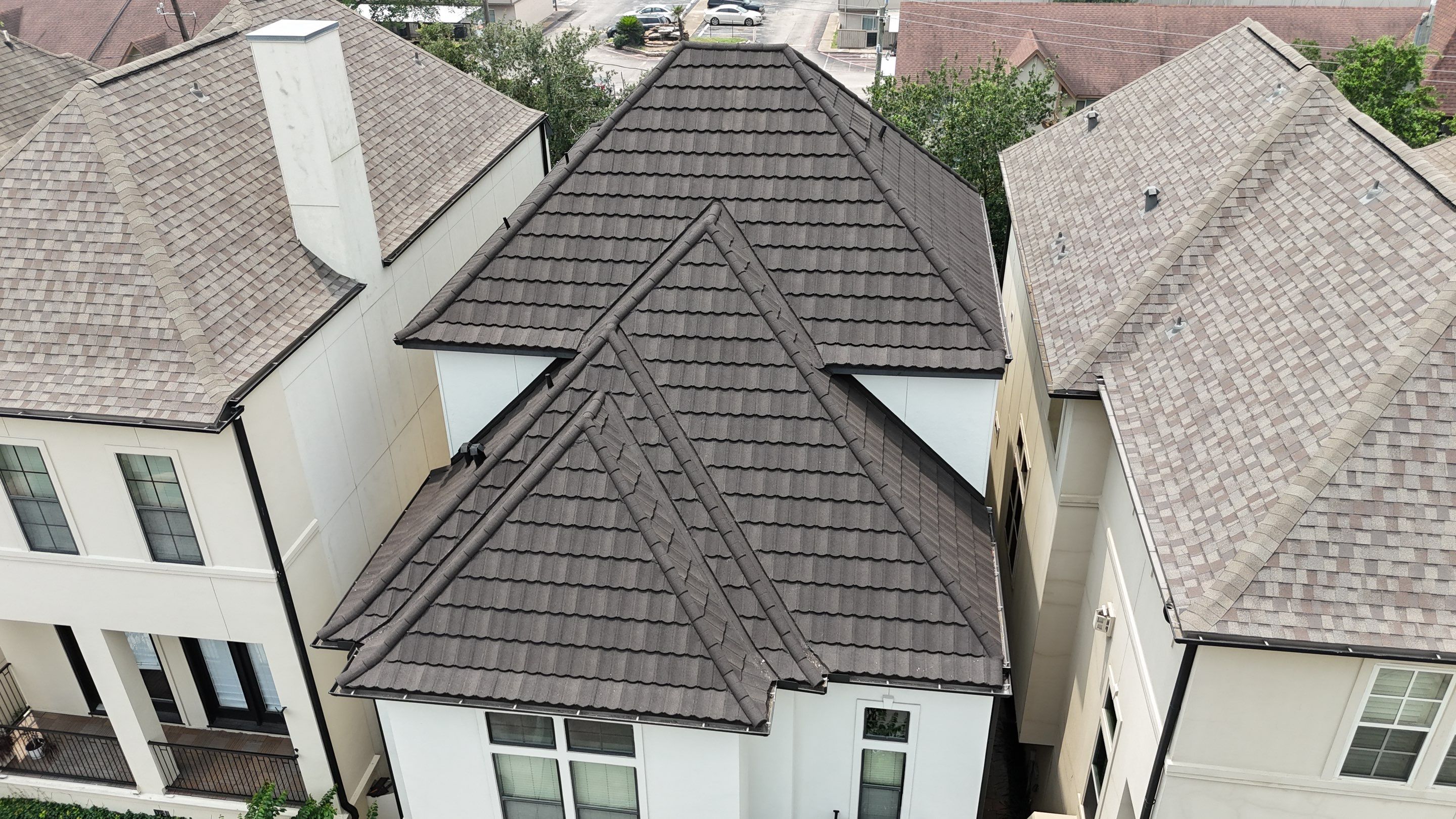 Stunning transformation from Shingles to DECRA Tile by Core Four Roofing