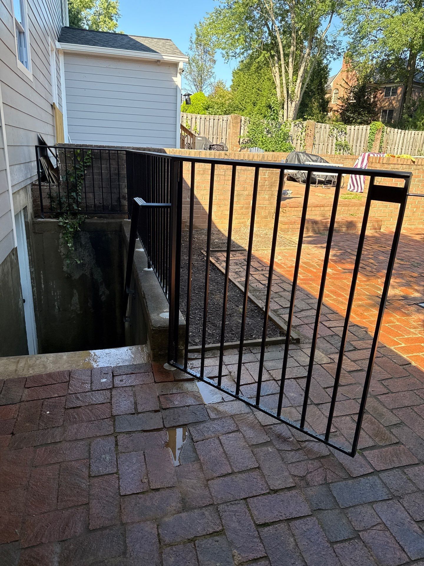 L-Shape Iron Railing & Integrated Safety Gate – Residential Exterior– McLean, VA by Capitol Iron Works