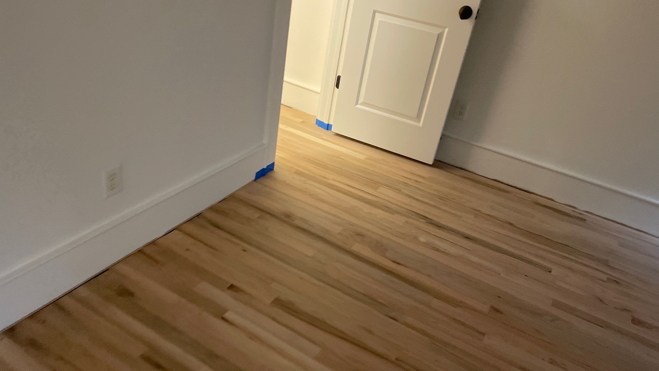 Herringbone Wood Hallway and Rooms by Footprints Floors of Coastal Carolina