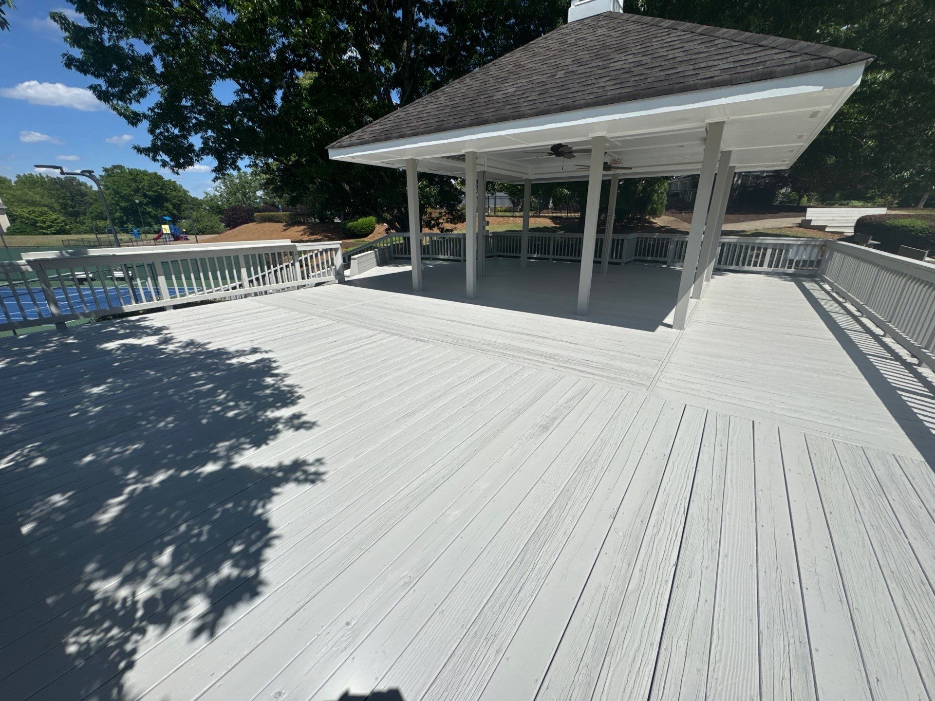 Exterior Deck and Pavilion Painting for Wexford Tennis Club in Roswell by Swift Home Renovations