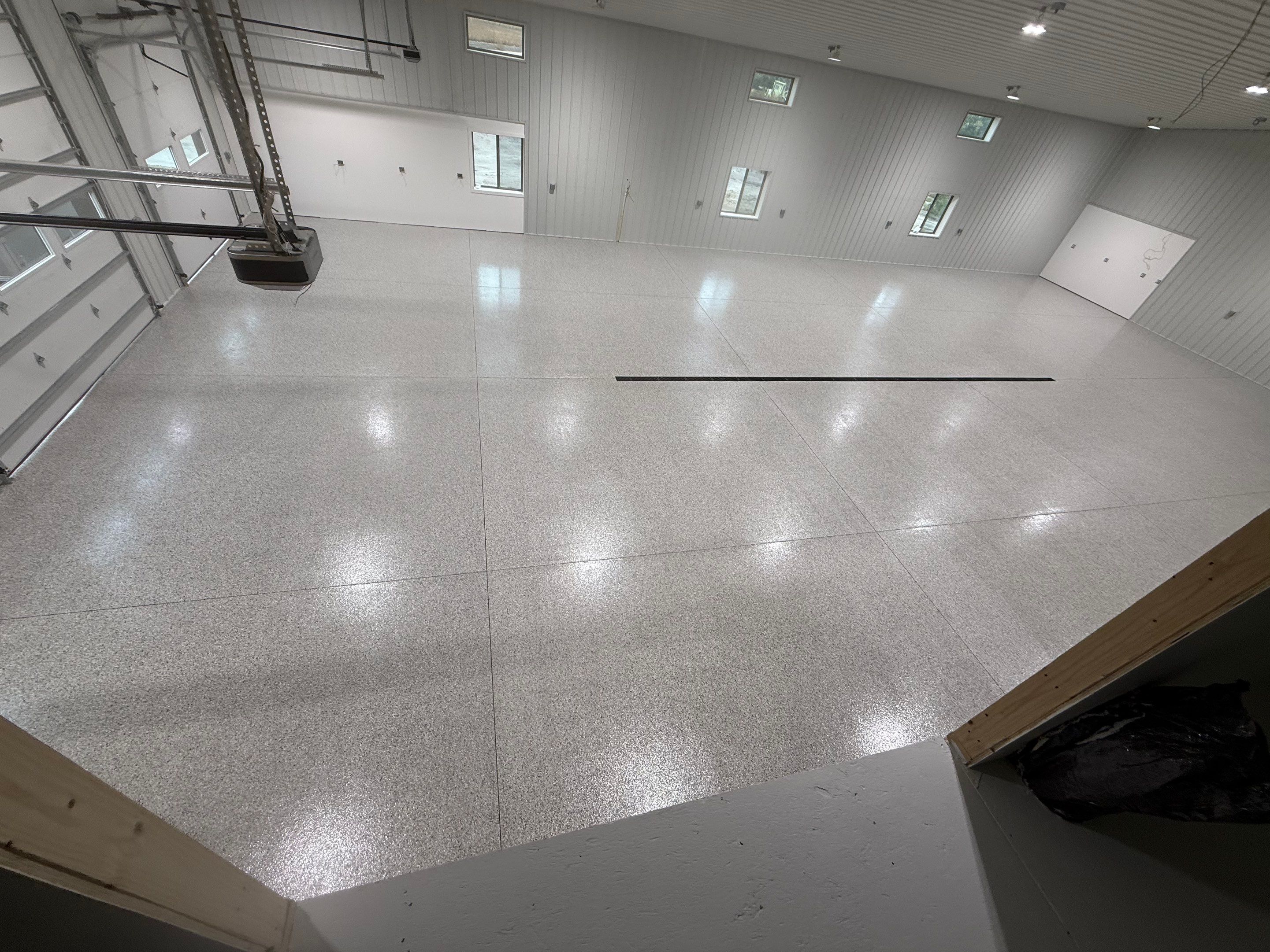 Custom Speckled Floor Coating for Large Montrose Shop by Select Painting, Coatings & Garage Cabinets