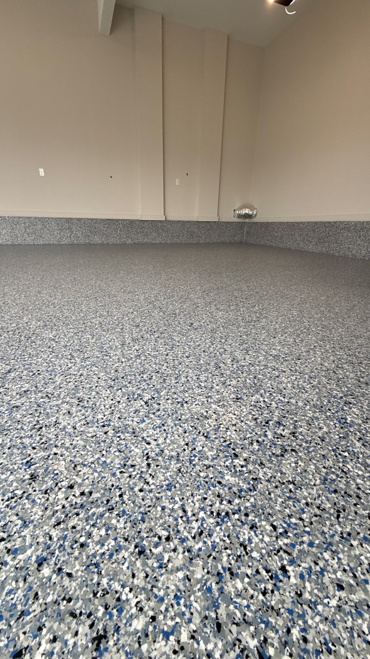 A Beautiful Comet Flake Floor  by Banner Garage