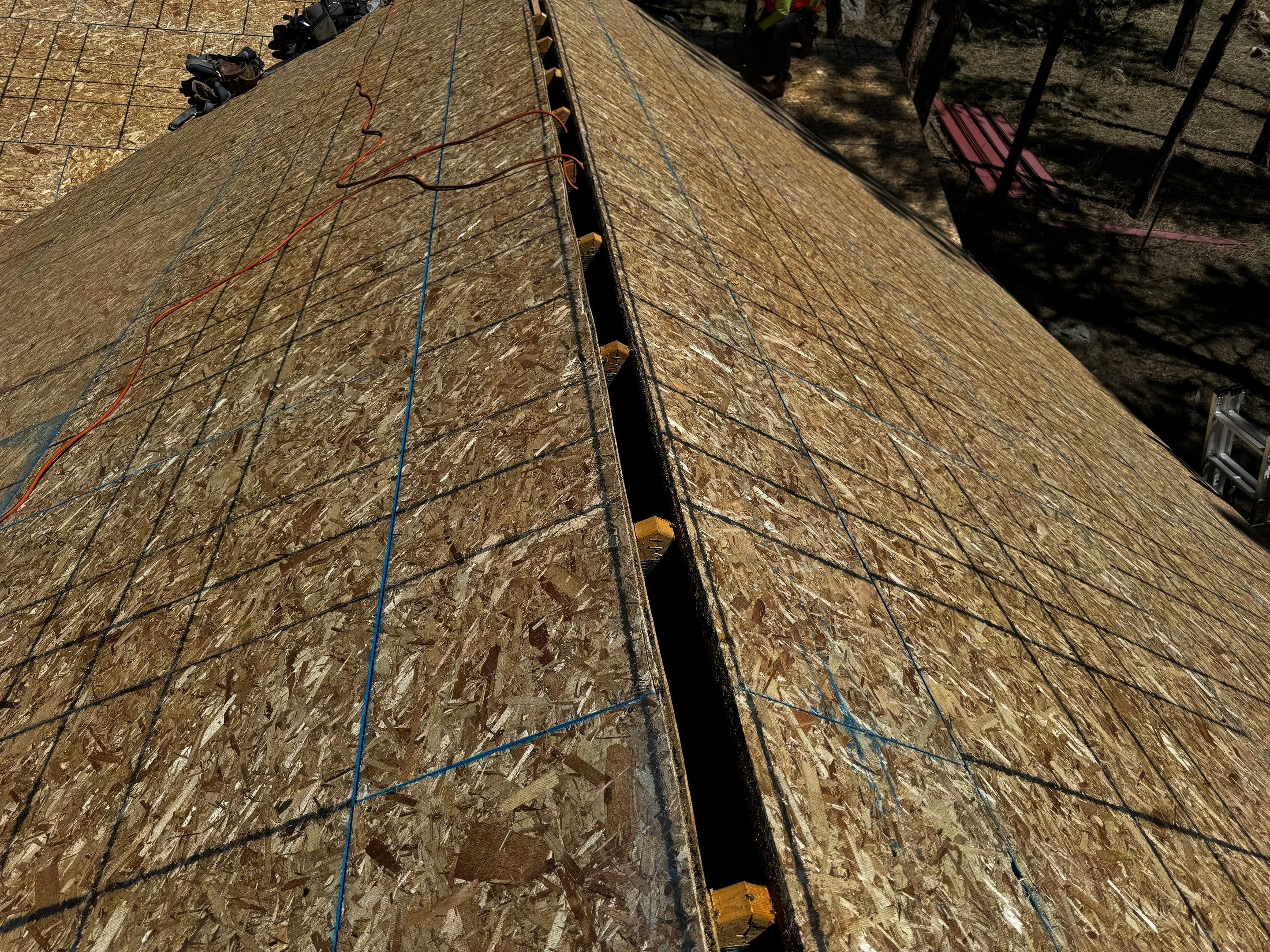 Residential Roofing Installation using Standing Seam Metal by Blue Peaks Roofing LLC 