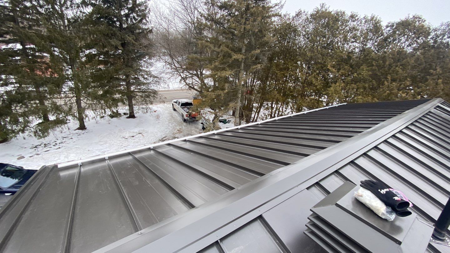 Residential Roofing Installation using 16" Standing Seam Panels by Jay Carter Roofing & Sheet Metal