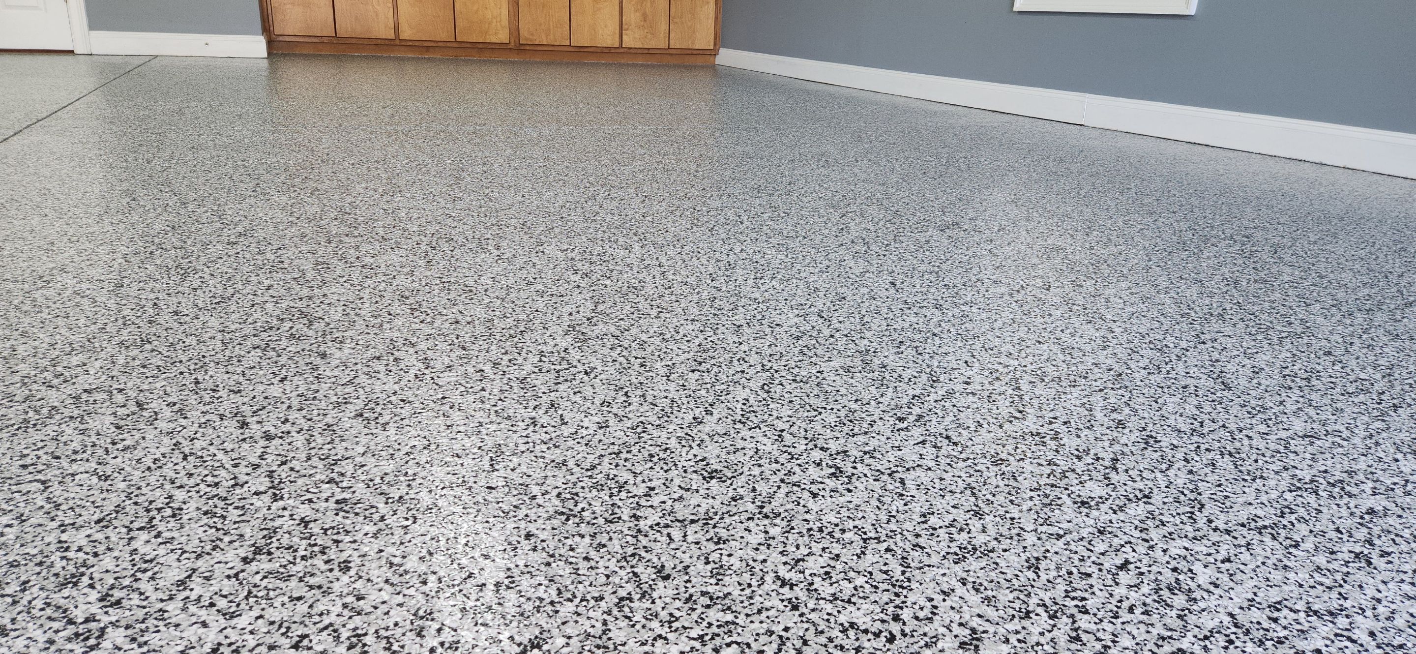 2 Garages Completed using Domino by Elite Floor Solutions