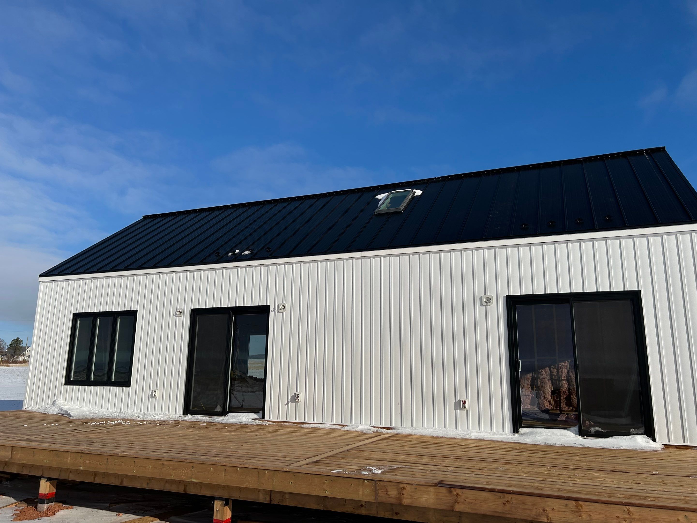 Residential Roofing Installation using Standing Seam Steel by Artisan Roofing & Home Improvements Inc.