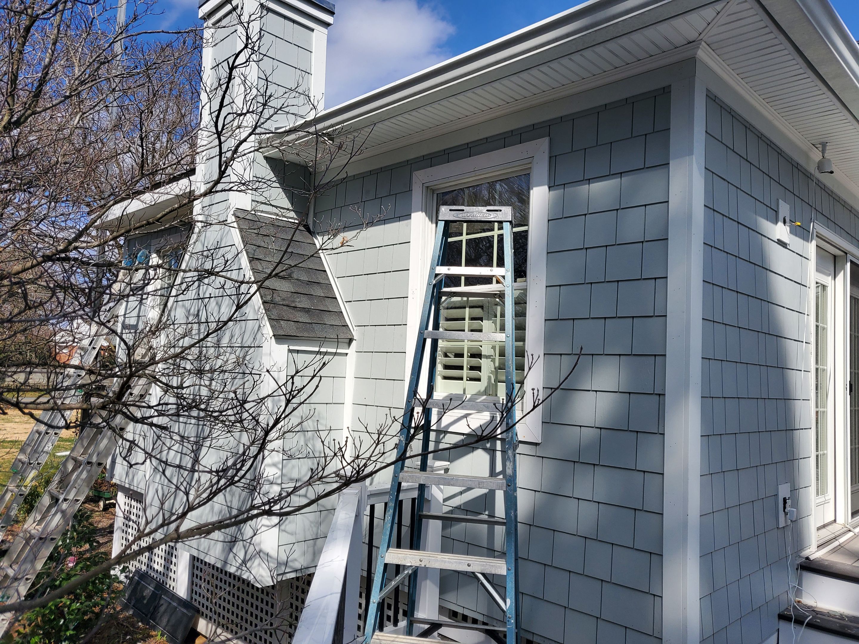 Siding Replacement using James Hardie siding by American Home Contractors