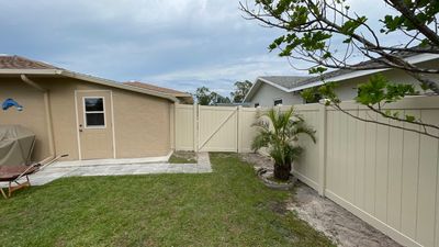 Vinyl Fence Installation using Vinyl Privacy Fence 