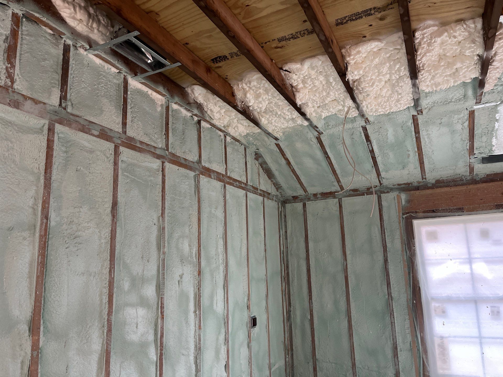 Basement Exterior Walls using Closed Cell Spray Foam by NYS Foam & Energy