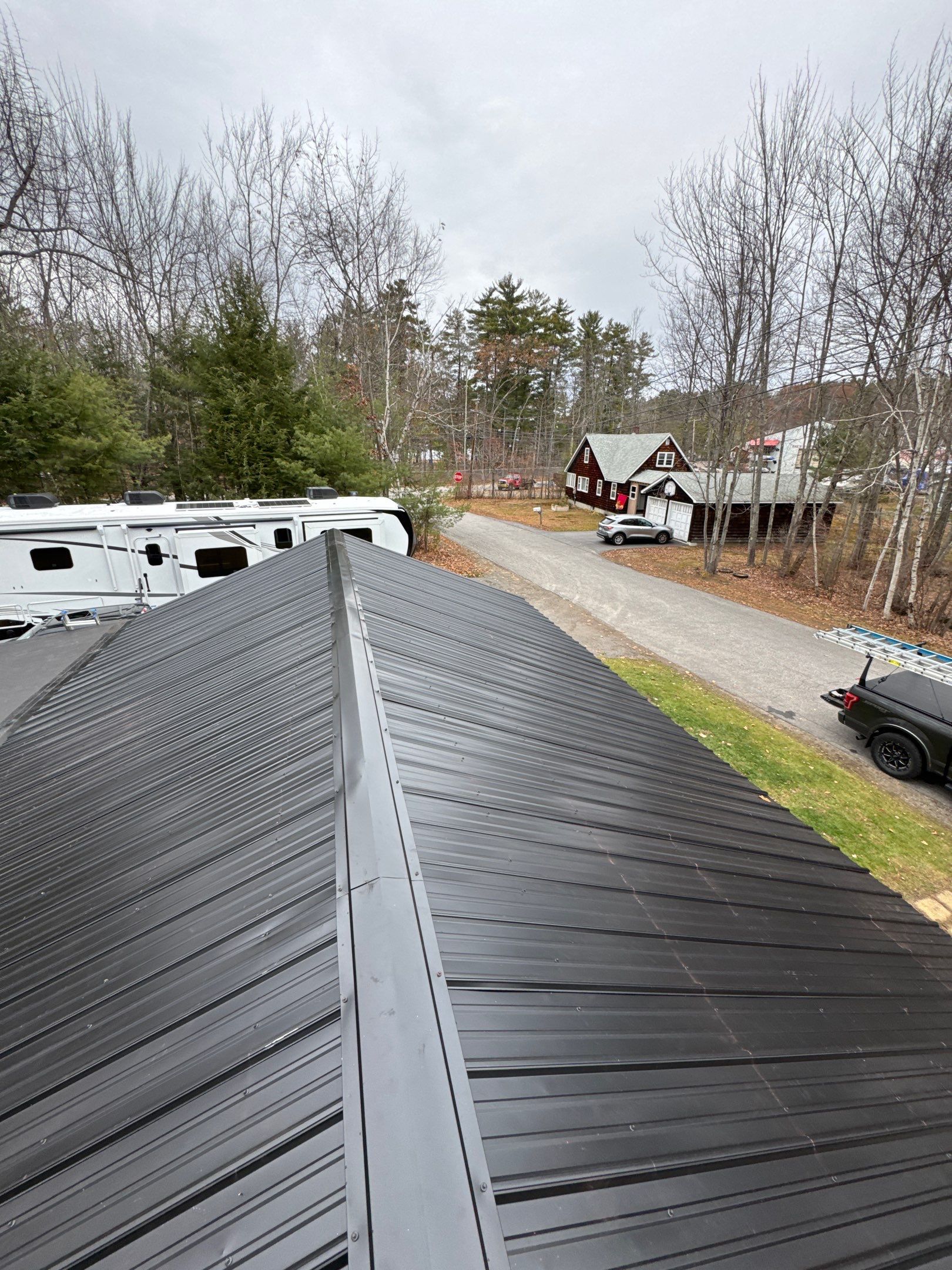 Gilford, NH Metal Roof Installation on Lake Winnipesaukee – Screw-Down Metal Roofing System by Compass exteriors