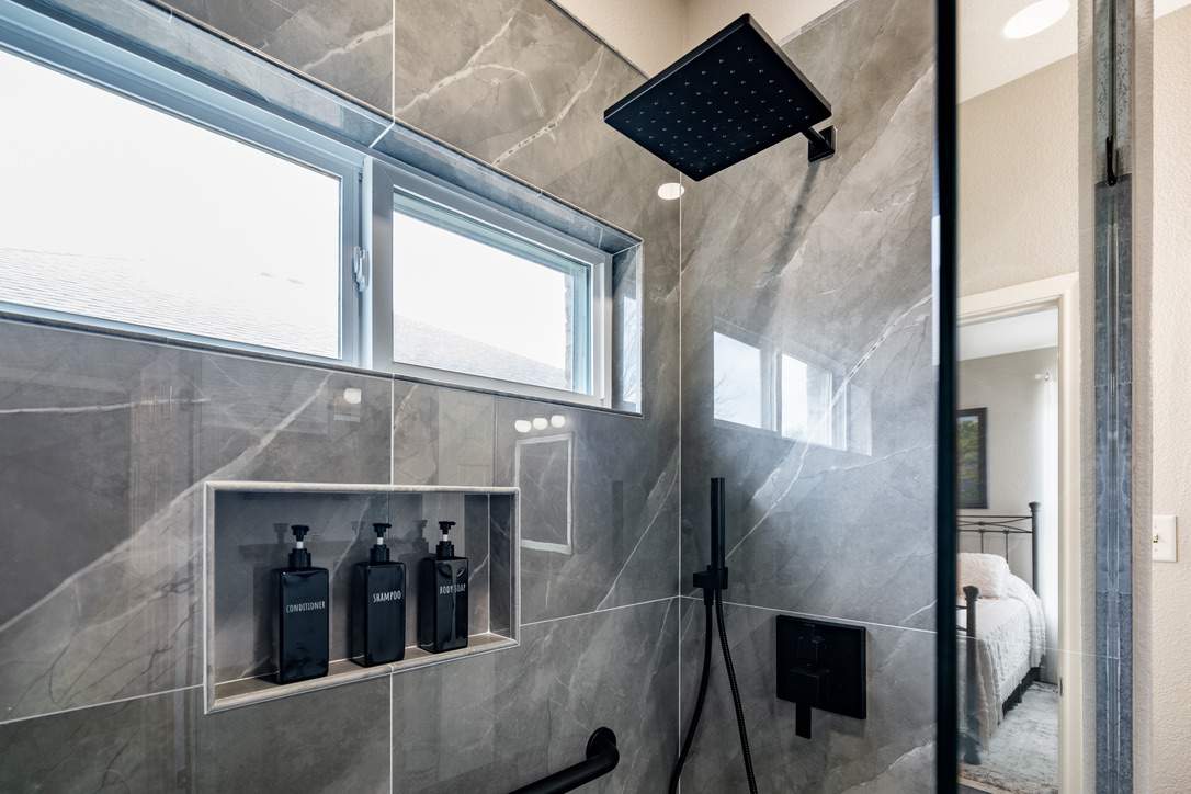 Bathroom Remodel using Large Format Tile by Esteem Living LLC