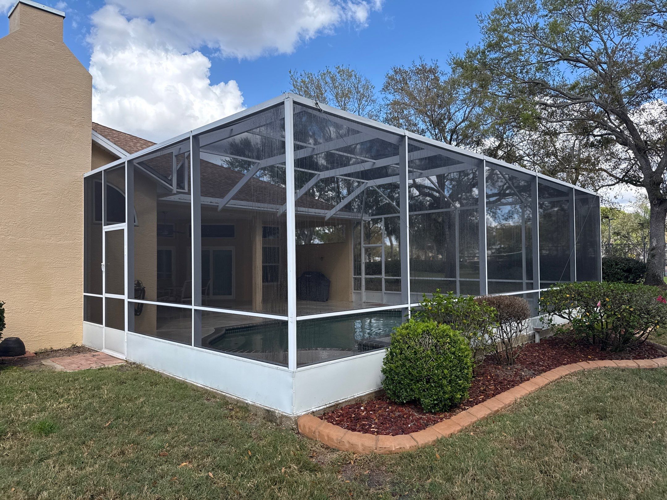 Painted Pool Deck, Pool Cage & Exterior Surface Cleaning in Creekwood – Bradenton, FL by Sunshine AquaWash