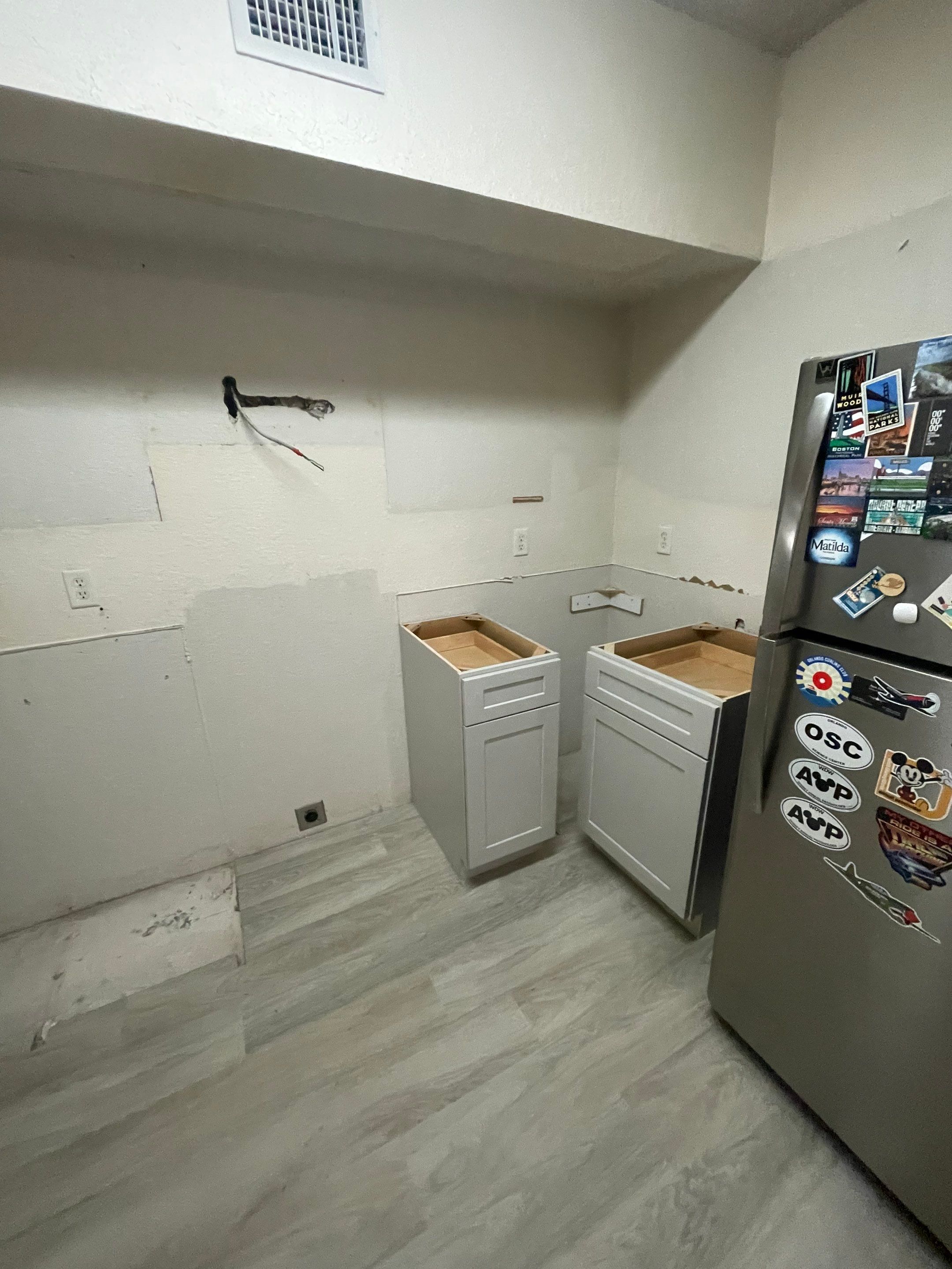 Home Remodel using LVP Flooring and Cabinets by HandyMangum