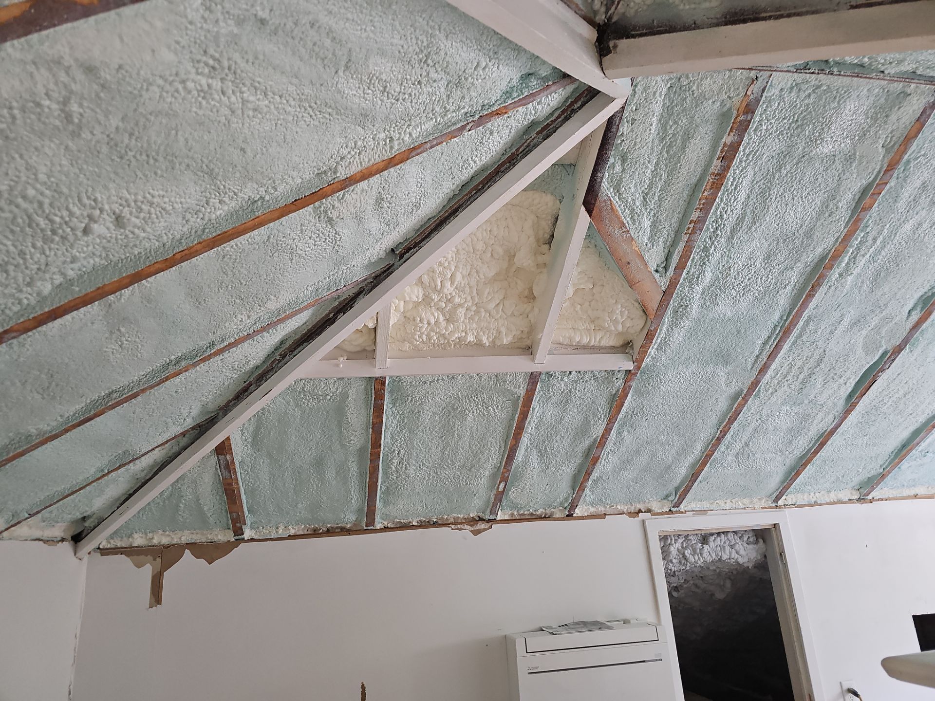 Attic Insulation using open cell spray foam by NYS Foam & Energy