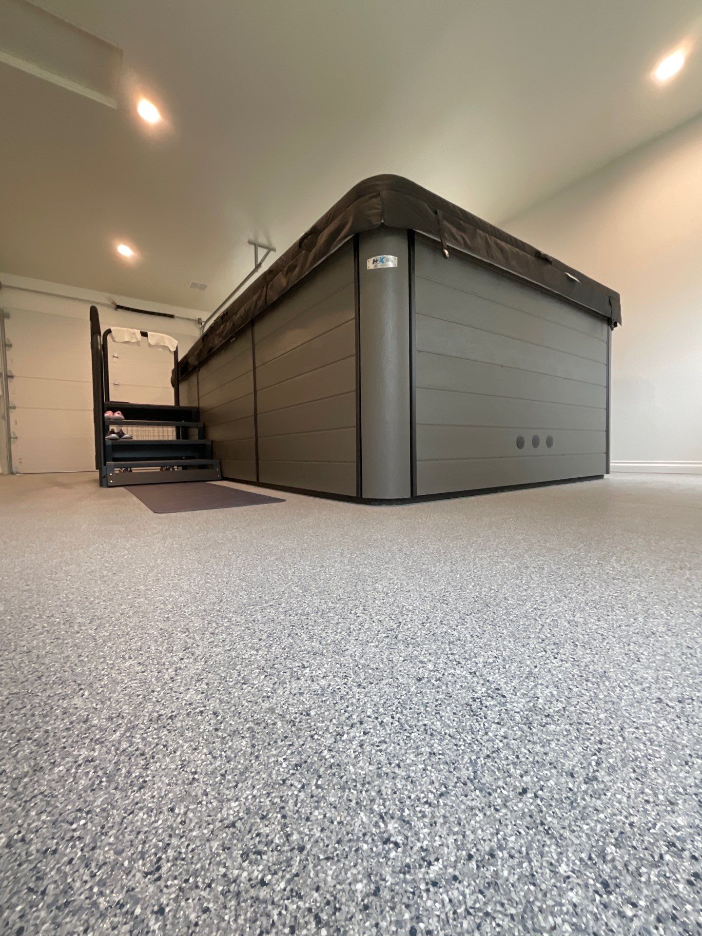 Hot Tub Installation using 1/8 Tidal Wave by Croc Coatings, LLC