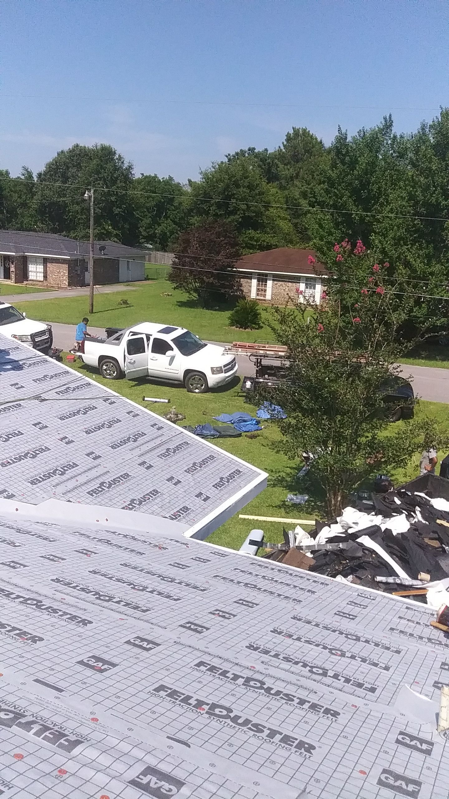 Residential Roofing Installation using Roof Replacement by American Roofing & Construction LLC
