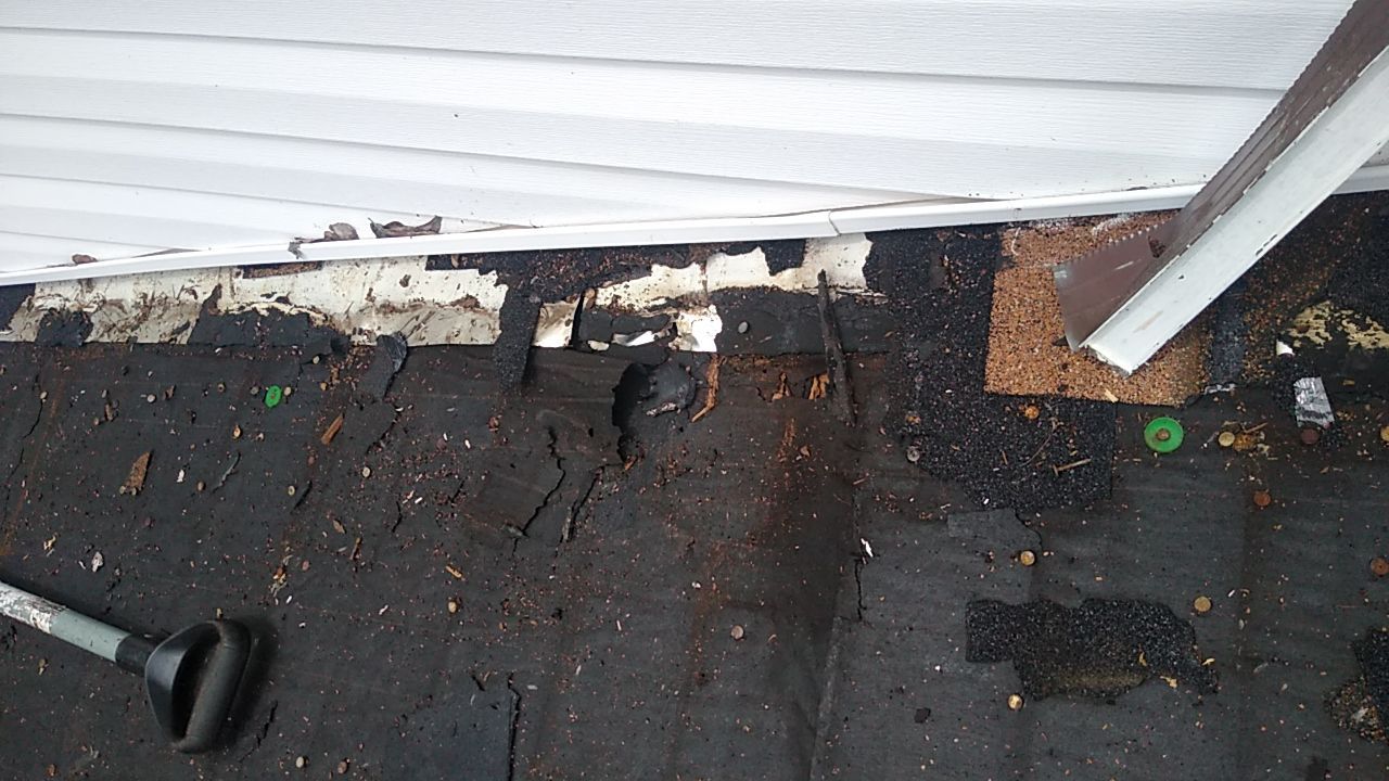 Residential Roofing Installation using Roof Replacement by American Roofing & Construction LLC