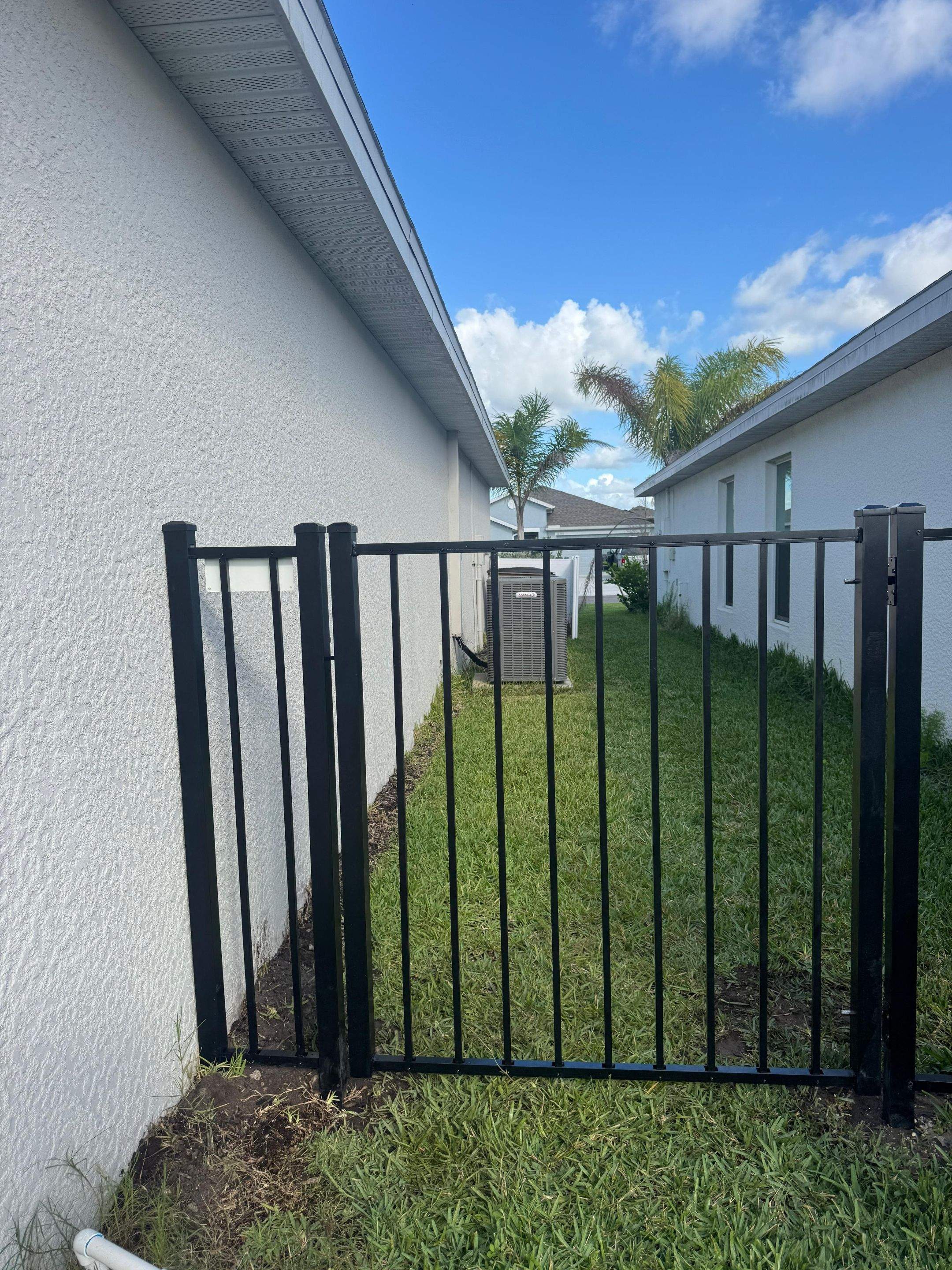 Black Aluminum Picket Fence Installation in Lehigh Acres by True Fence LLC