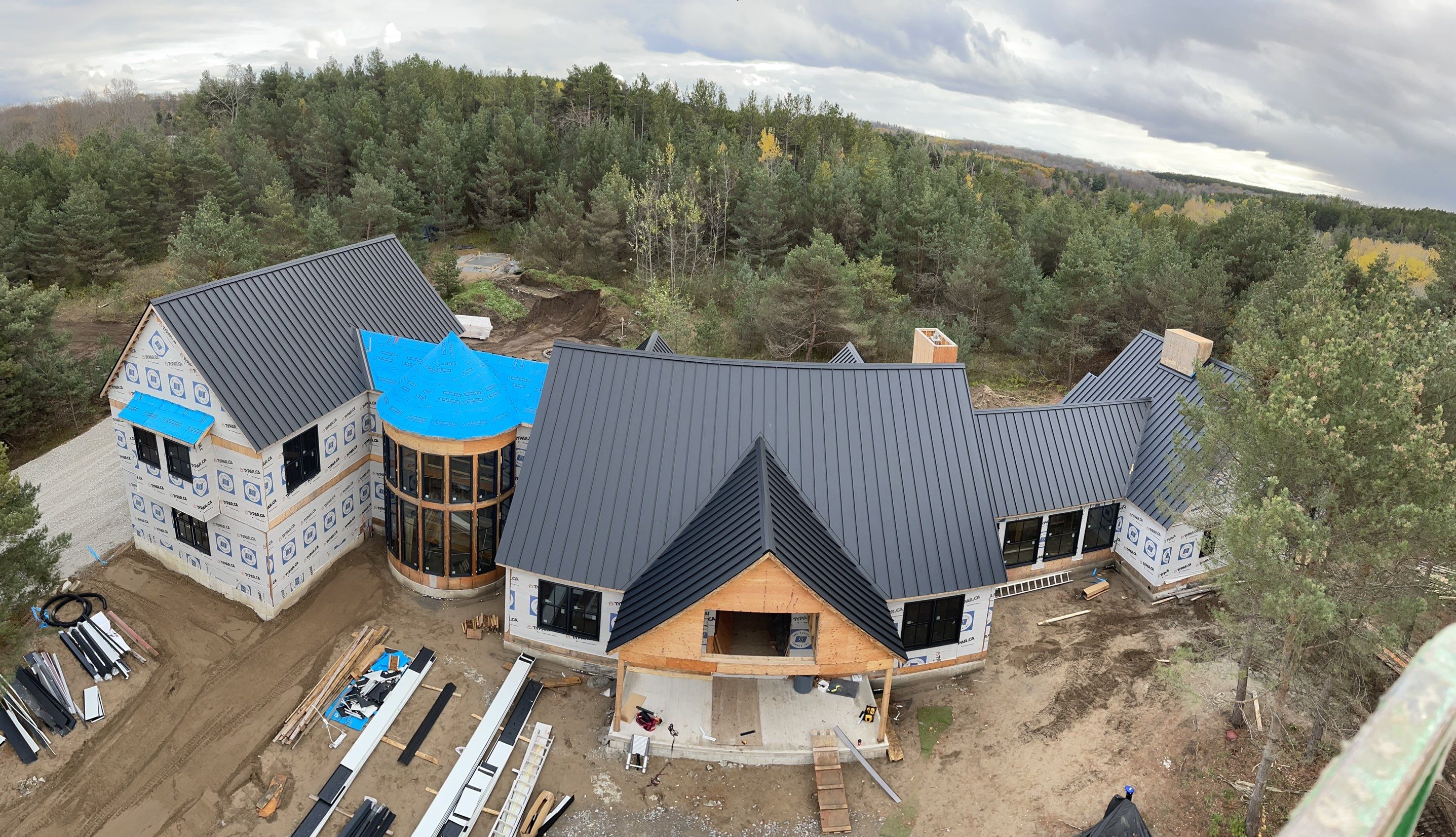 New Home Construction using 16" Standing Seam Panels by Jay Carter Roofing & Sheet Metal